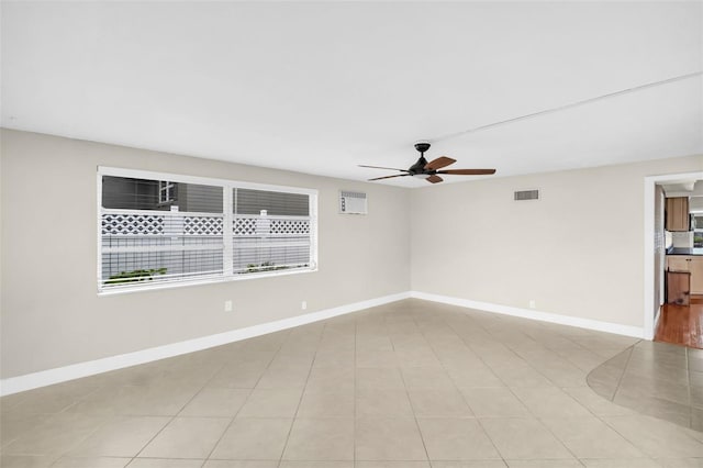 250 W Canal Dr, Palm Harbor, FL 34684 - empty room with a ceiling fan and light tile patterned floors