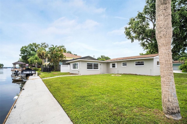 250 W Canal Dr, Palm Harbor, FL 34684 - rear view of property featuring a water view