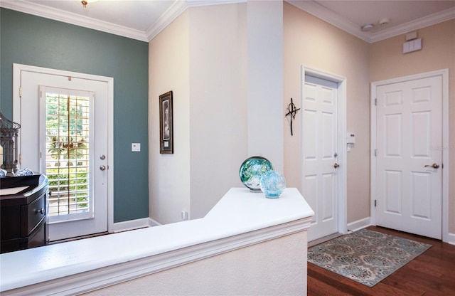 6303 Vista Verde Dr E, Gulfport, FL 33707 - entrance foyer with crown molding, dark wood finished floors, and baseboards
