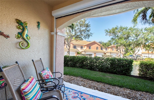 6303 Vista Verde Dr E, Gulfport, FL 33707 - view of patio with a residential view