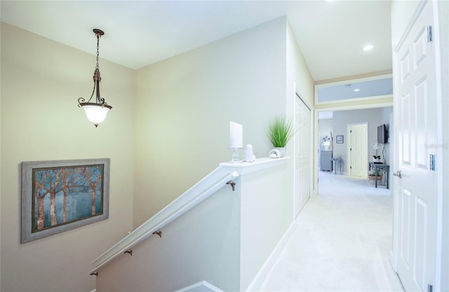 6303 Vista Verde Dr E, Gulfport, FL 33707 - corridor with recessed lighting, baseboards, an upstairs landing, and light carpet