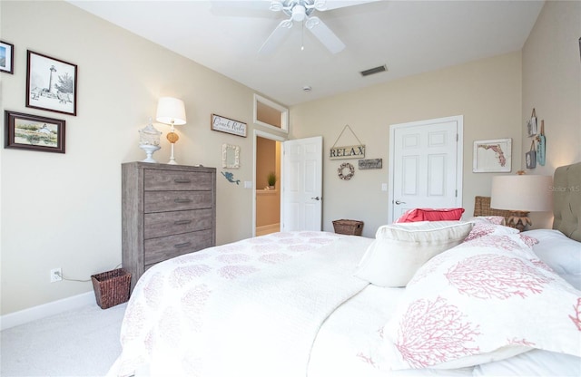 6303 Vista Verde Dr E, Gulfport, FL 33707 - bedroom featuring visible vents, a ceiling fan, carpet, and baseboards