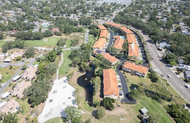 6303 Vista Verde Dr E, Gulfport, FL 33707 - bird's eye view featuring a water view, view of golf course, and a residential view
