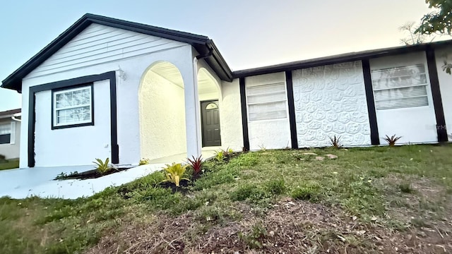 3145 Munson St, New Port Richey, FL 34655 - view of front of home with stucco siding