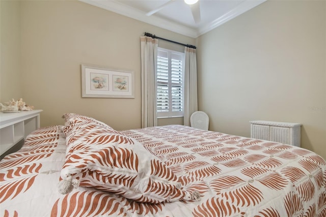 bedroom with ornamental molding