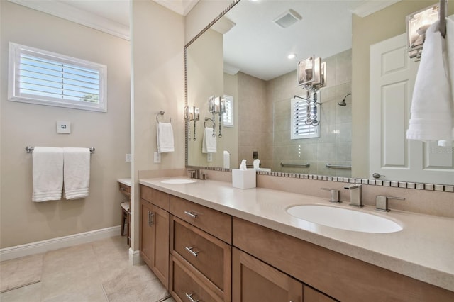 bathroom featuring a sink, baseboards, walk in shower, and double vanity