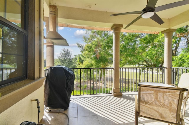 balcony featuring a ceiling fan