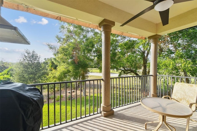 balcony with a ceiling fan and a grill