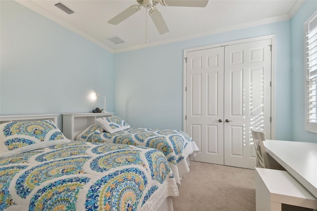 bedroom with crown molding, visible vents, light carpet, and multiple windows