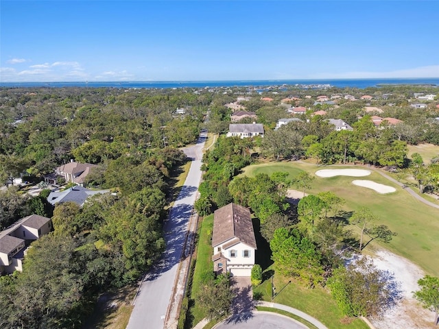 aerial view featuring view of golf course and a residential view