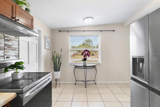 8184 Rose Ter, Seminole, FL 33777 - kitchen with electric range, baseboards, brown cabinets, stainless steel fridge with ice dispenser, and under cabinet range hood