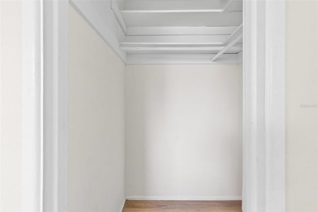 8184 Rose Ter, Seminole, FL 33777 - spacious closet with wood finished floors