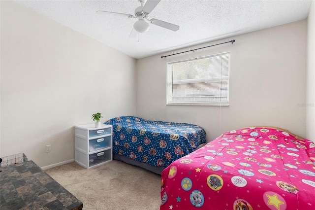 8184 Rose Ter, Seminole, FL 33777 - bedroom featuring a ceiling fan, carpet, and a textured ceiling