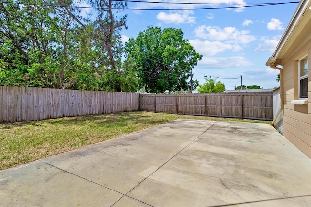 8184 Rose Ter, Seminole, FL 33777 - view of patio with a fenced backyard