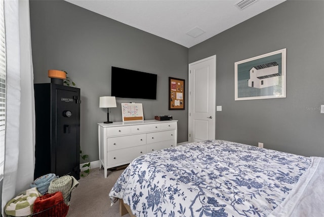 bedroom featuring carpet floors and baseboards