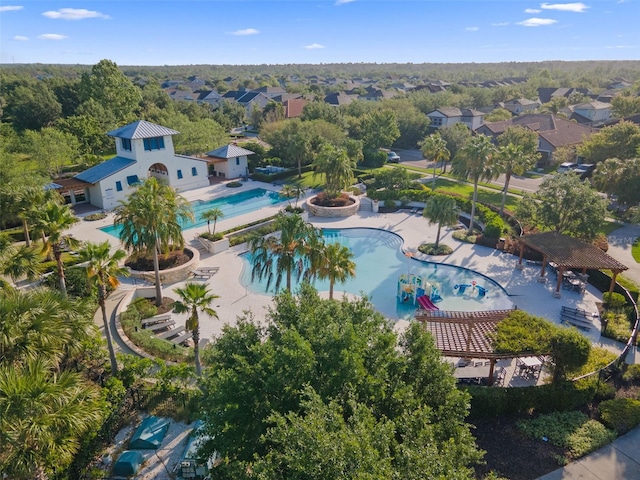 drone / aerial view of a pool