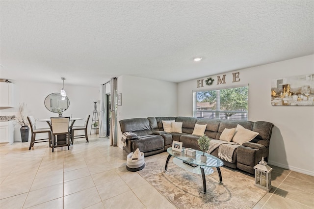 10463 Baylor Dr, Spring Hill, FL 34608 - living area featuring a textured ceiling and light tile patterned floors