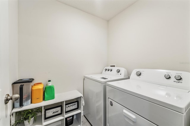 10463 Baylor Dr, Spring Hill, FL 34608 - laundry area featuring washer and dryer and laundry area