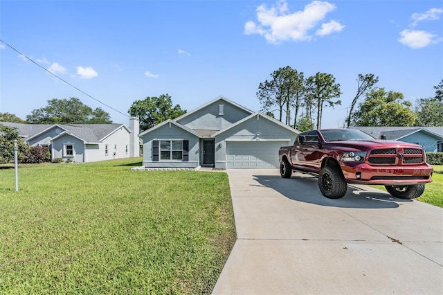 10463 Baylor Dr, Spring Hill, FL 34608 - single story home with a garage, a front lawn, and concrete driveway