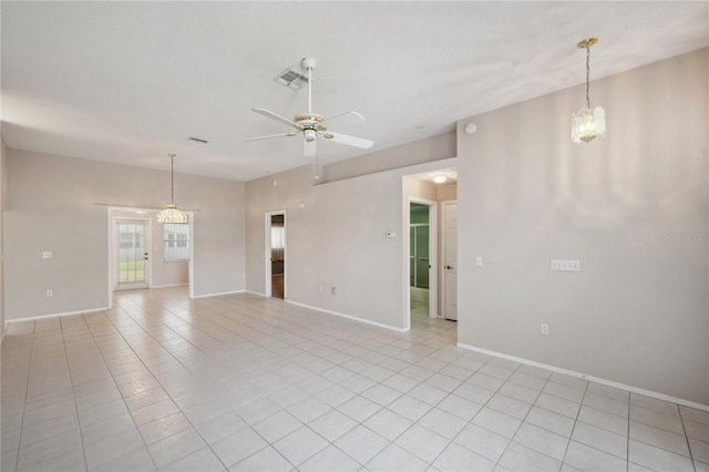 unfurnished living room featuring visible vents, baseboards, ceiling fan, and light tile patterned floors