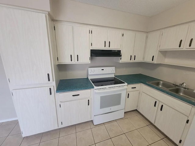 1309 Malone Ave, Spring Hill, FL 34606 - kitchen with under cabinet range hood, dark countertops, a sink, light tile patterned flooring, and electric range