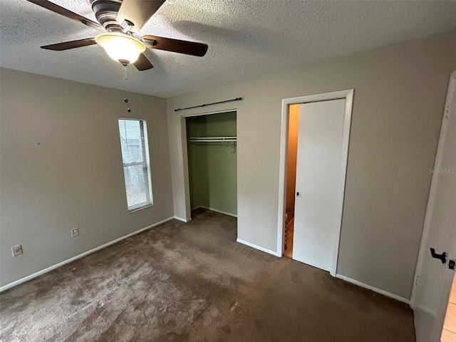 1309 Malone Ave, Spring Hill, FL 34606 - unfurnished bedroom featuring baseboards, carpet floors, a textured ceiling, and a closet