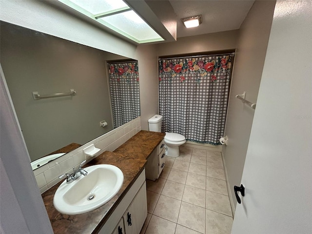 1309 Malone Ave, Spring Hill, FL 34606 - bathroom with vanity, tile patterned flooring, a shower with shower curtain, and toilet