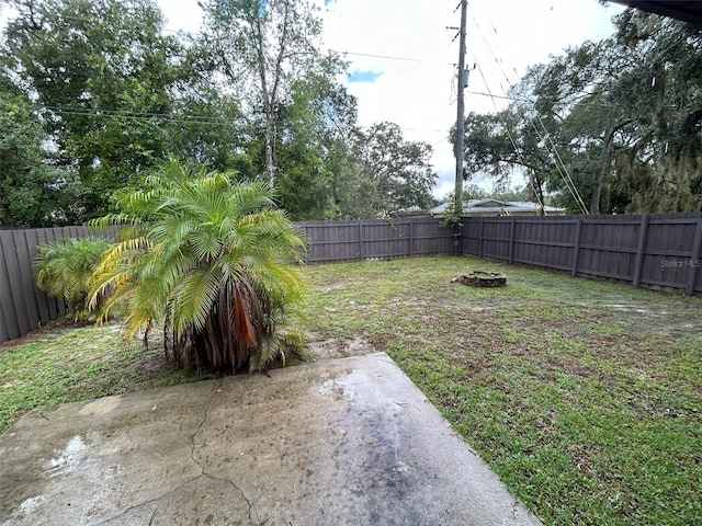 1309 Malone Ave, Spring Hill, FL 34606 - view of yard featuring a patio area and a fenced backyard
