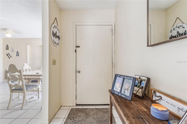1309 Malone Ave, Spring Hill, FL 34606 - foyer featuring light tile patterned flooring