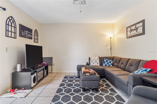 1309 Malone Ave, Spring Hill, FL 34606 - living room featuring visible vents and light tile patterned floors