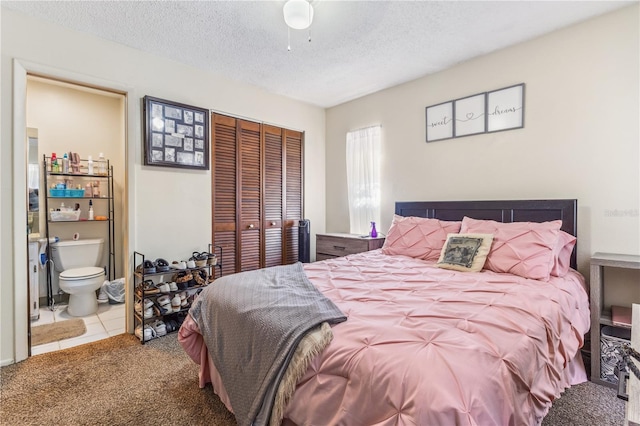1309 Malone Ave, Spring Hill, FL 34606 - bedroom featuring a textured ceiling, ensuite bath, carpet, and a closet
