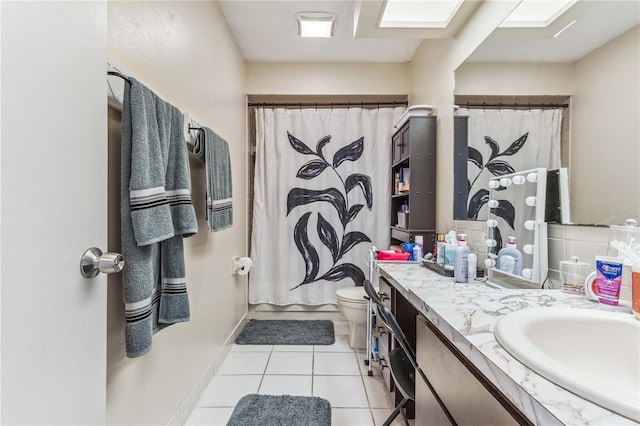 1309 Malone Ave, Spring Hill, FL 34606 - bathroom featuring a shower with curtain, vanity, tile patterned flooring, and toilet