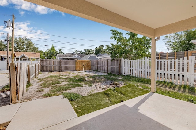 view of yard featuring a fenced backyard and a patio area