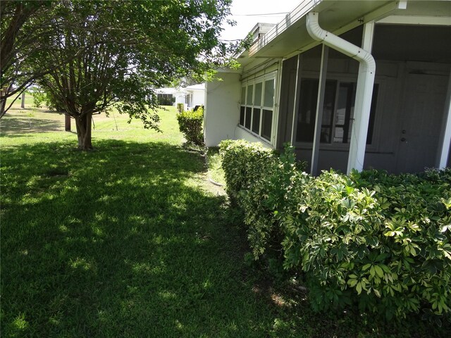 9825 41st St N, Pinellas Park, FL 33782 - view of yard with a sunroom