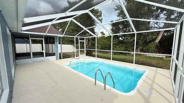 28818 Midnight Star Loop, Wesley Chapel, FL 33543 - outdoor pool with a patio and glass enclosure