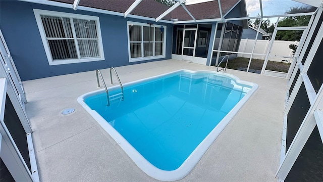 28818 Midnight Star Loop, Wesley Chapel, FL 33543 - view of pool featuring a patio, a sunroom, and a lanai
