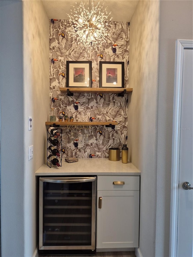 bar with beverage cooler and a bar