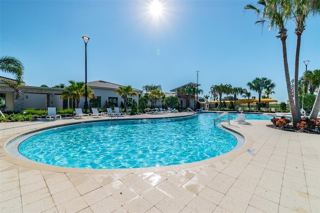 pool with a patio