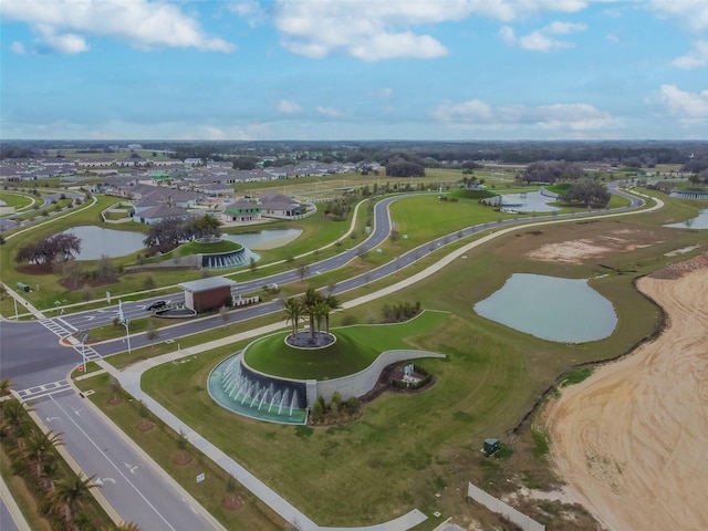 birds eye view of property with a residential view and a water view