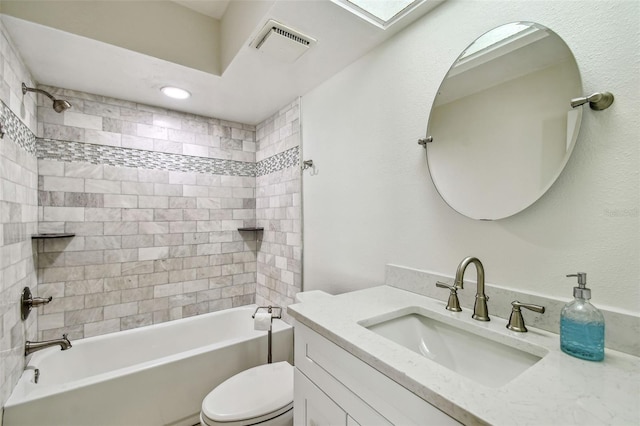 bathroom featuring toilet, visible vents, bathing tub / shower combination, and vanity