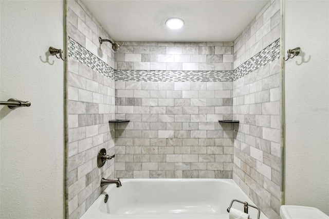 full bath with toilet and bathtub / shower combination