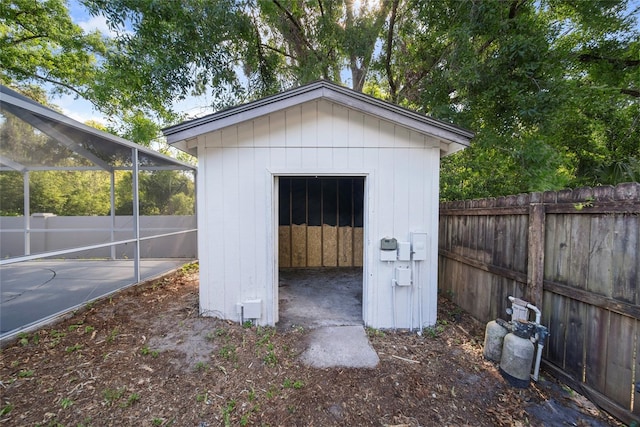 view of shed featuring a fenced backyard