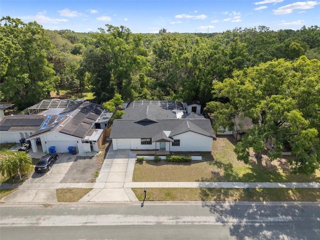 view from above of property featuring a forest