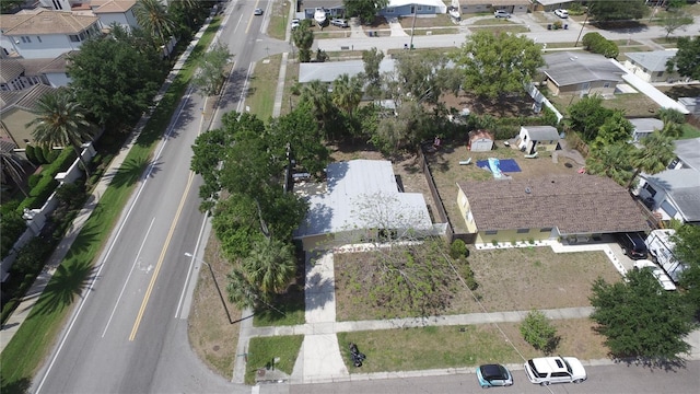 birds eye view of property with a residential view