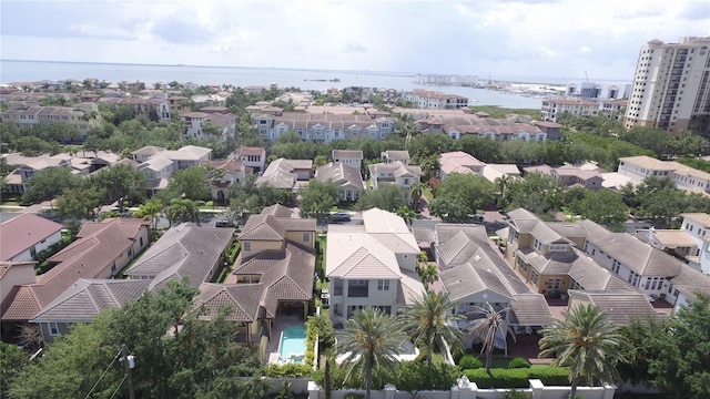 aerial view featuring a water view and a residential view