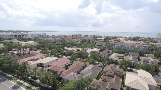 aerial view with a residential view and a water view
