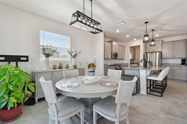 dining space featuring recessed lighting, light tile patterned floors, and visible vents