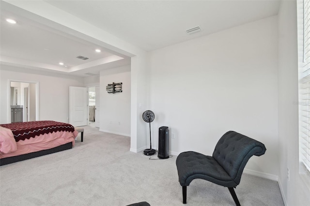 carpeted bedroom featuring visible vents, recessed lighting, baseboards, and a raised ceiling