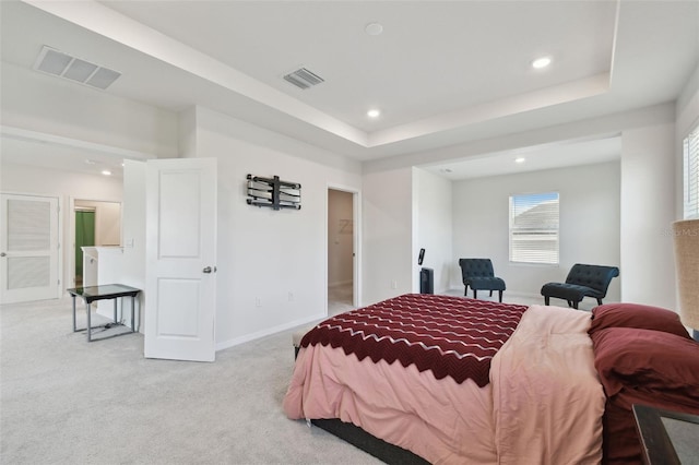 bedroom featuring baseboards, light carpet, recessed lighting, and visible vents