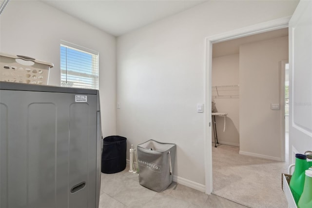 interior space featuring baseboards